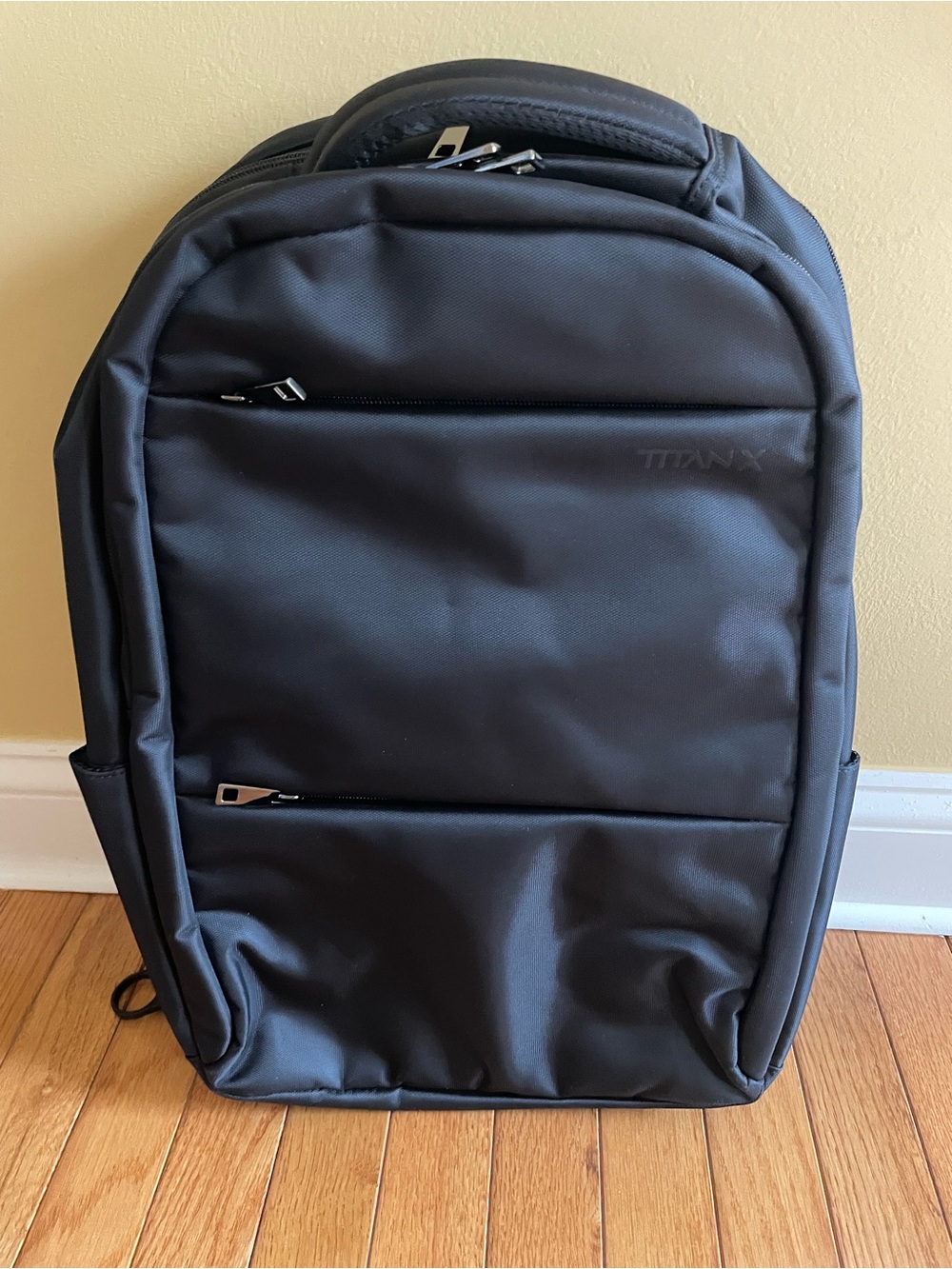 Titan x Black Backpack with Front Zip Pockets waterproof. 20L